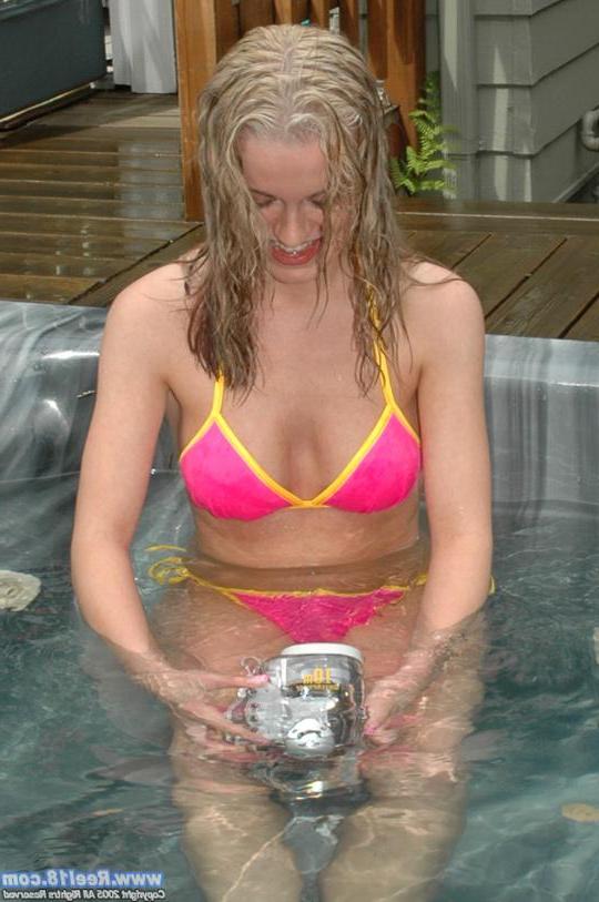 20P Pictures of a cute blond coed flashing in her bikini