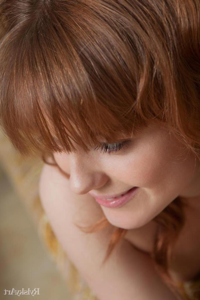 16P Redhead model Amy shows you her tight pussy in black stockings