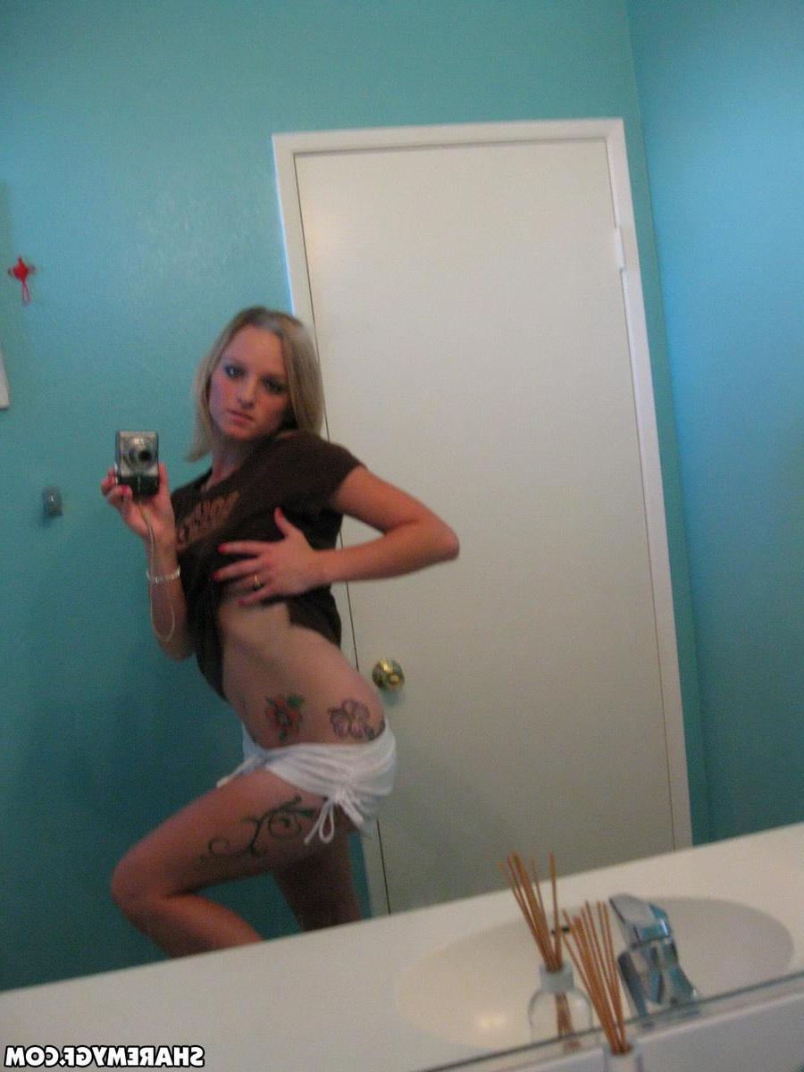 20P Hot blonde coed takes some selfies of her nude body in the bathroom