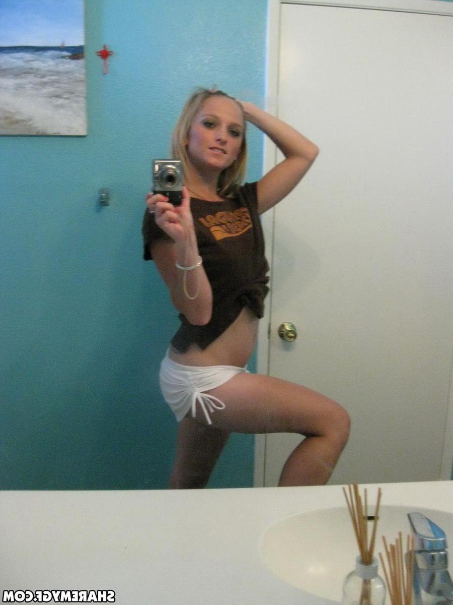 20P Hot blonde coed takes some selfies of her nude body in the bathroom
