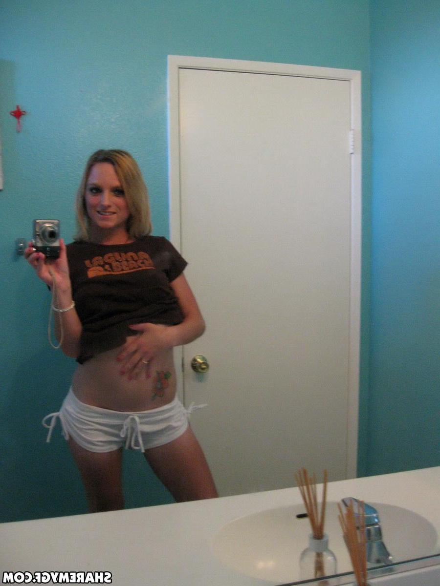 20P Hot blonde coed takes some selfies of her nude body in the bathroom