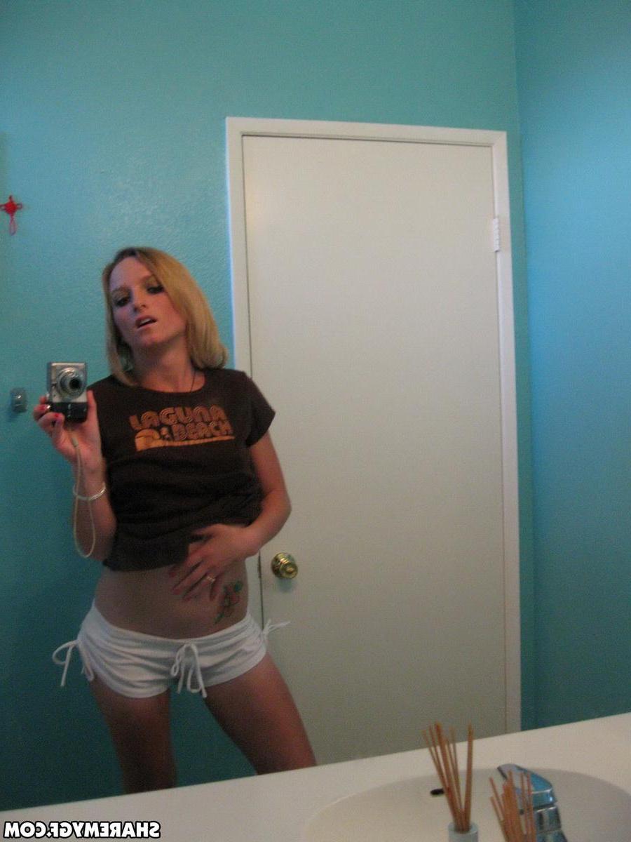 20P Hot blonde coed takes some selfies of her nude body in the bathroom