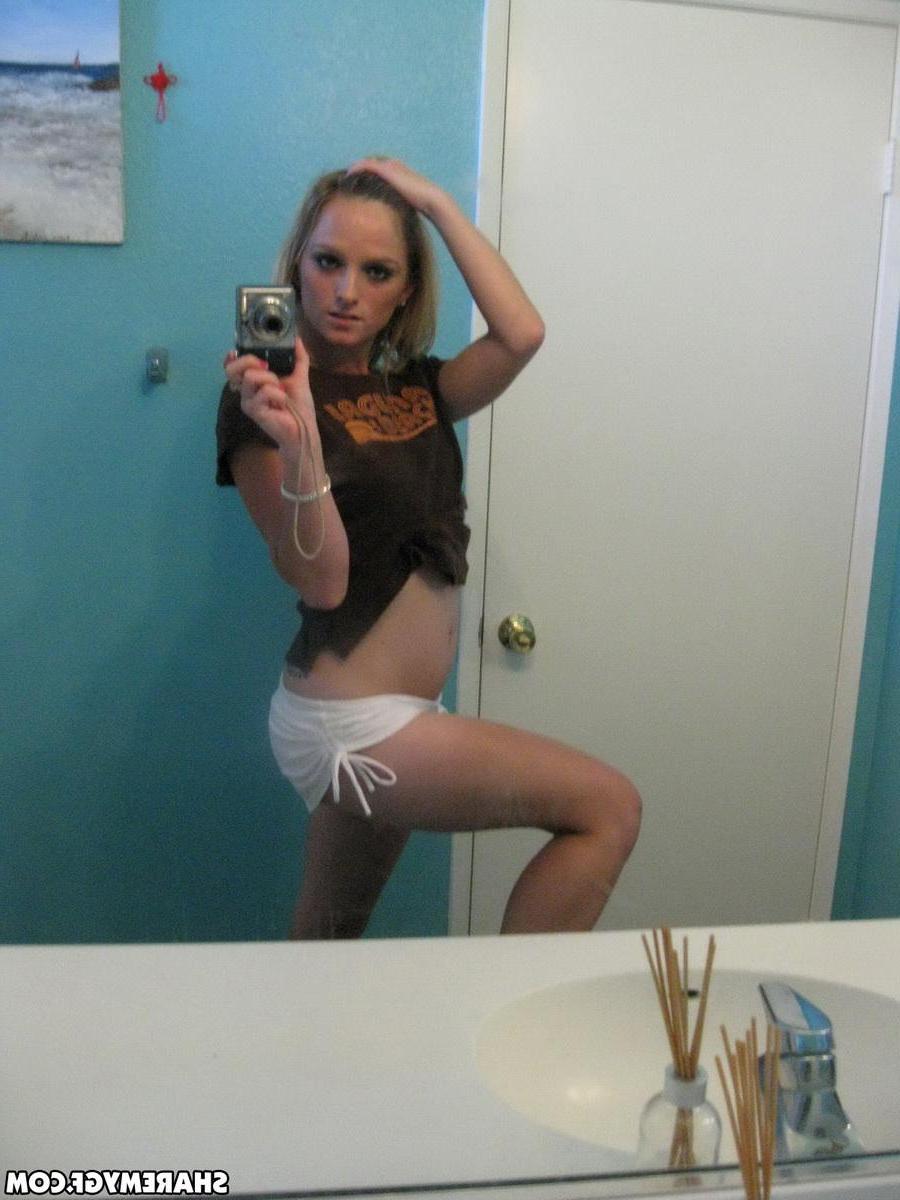 20P Hot blonde coed takes some selfies of her nude body in the bathroom
