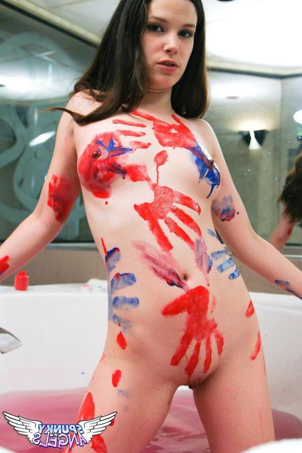 20P Pictures of a hot brunette angel getting kinky with the body paint