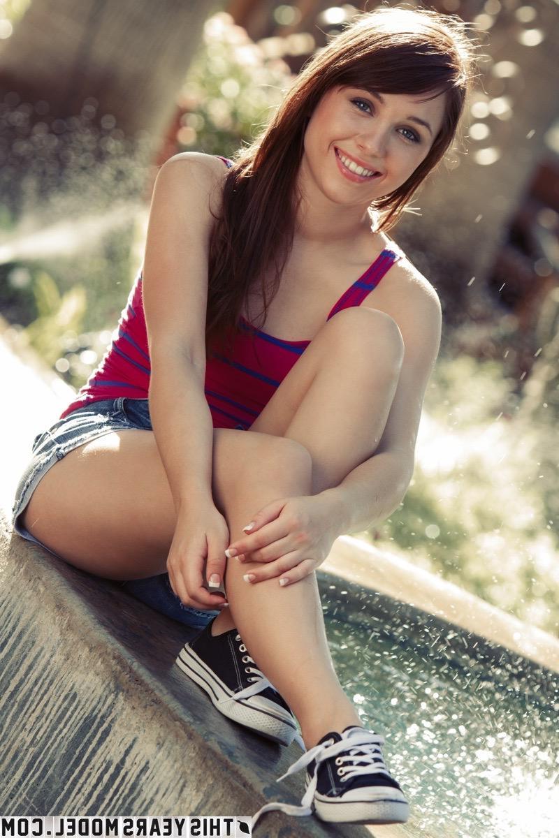 15P Brunette teen Marissa May gets naked in a public fountain