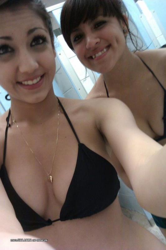 14P Kinky bikini teens camwhoring in a beach resort's bathroom