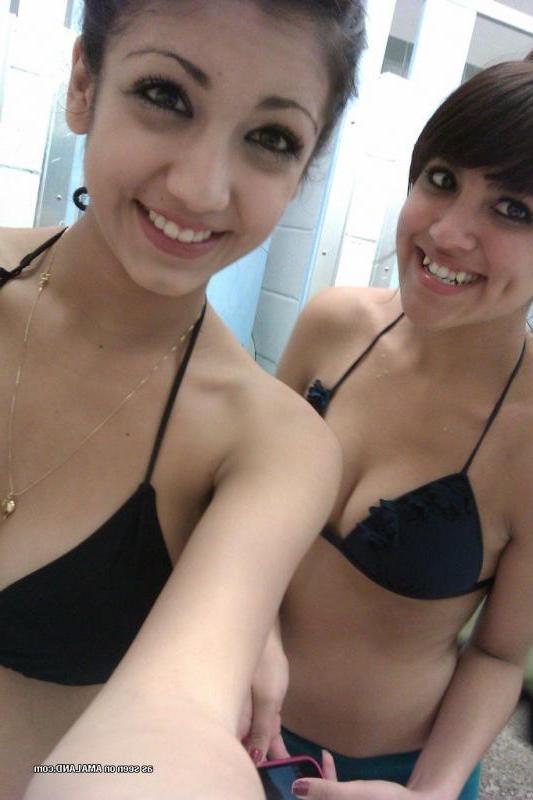 14P Kinky bikini teens camwhoring in a beach resort's bathroom