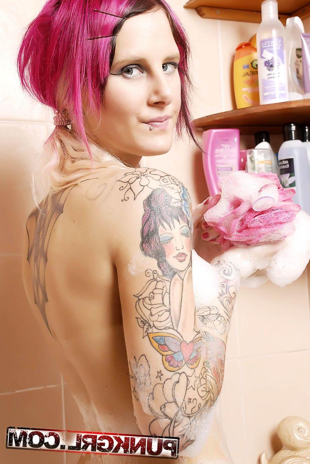 20P Pictures of teen punk Pink Trash getting all wet for you
