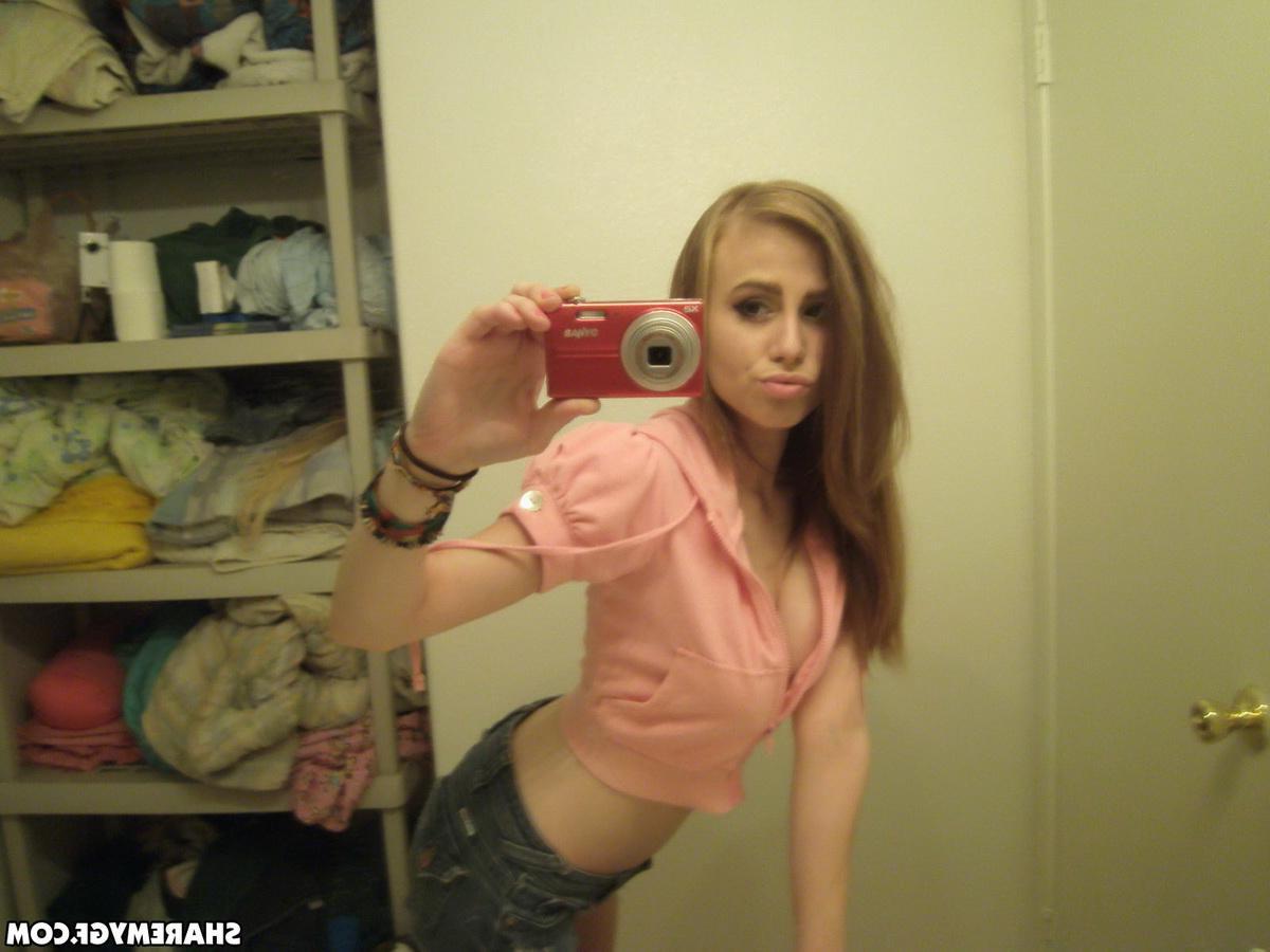 20P Brunette coed takes selfies of her boobs and pussy in the bathroom