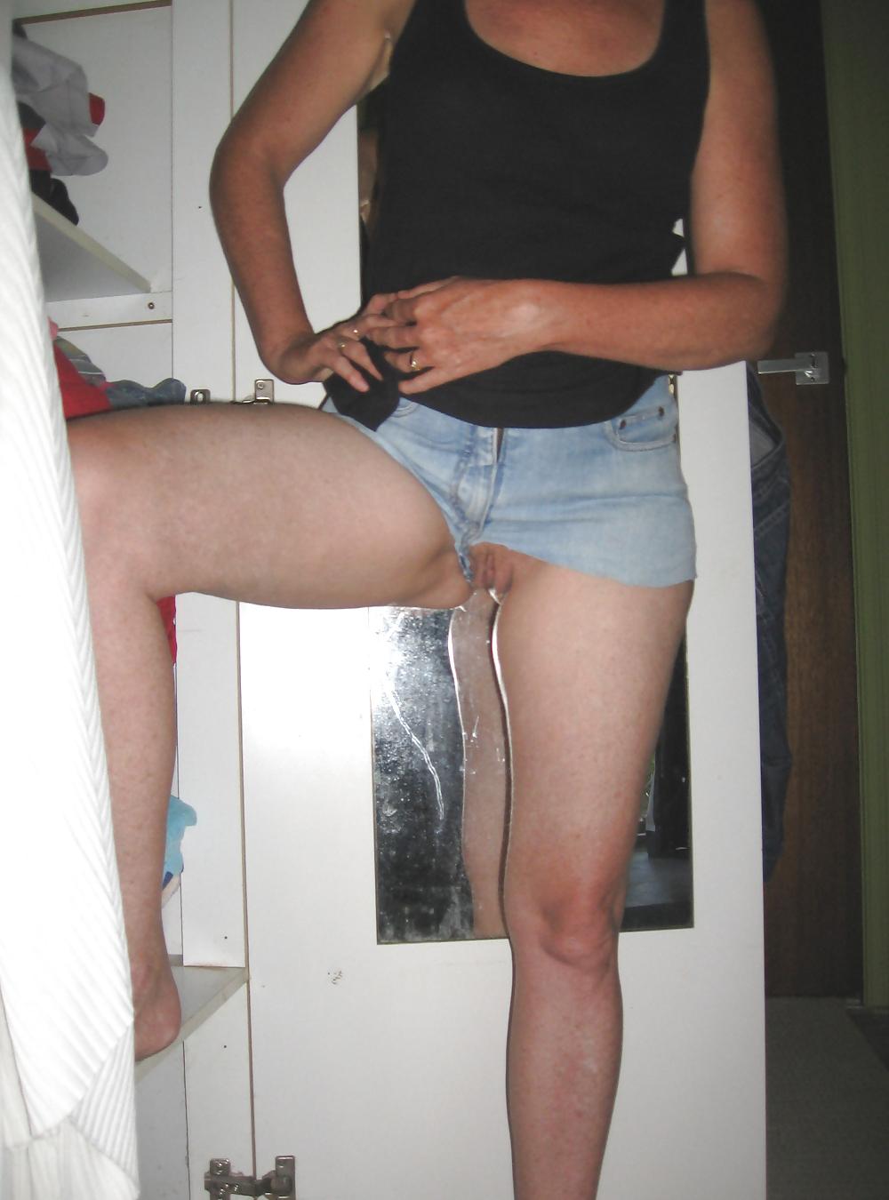 12P My redhead wife's jean shorts