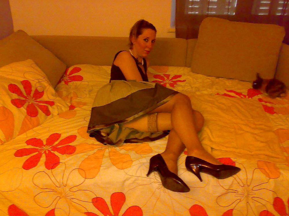 25P Waiting for him in miniskirt stockings and hight heels