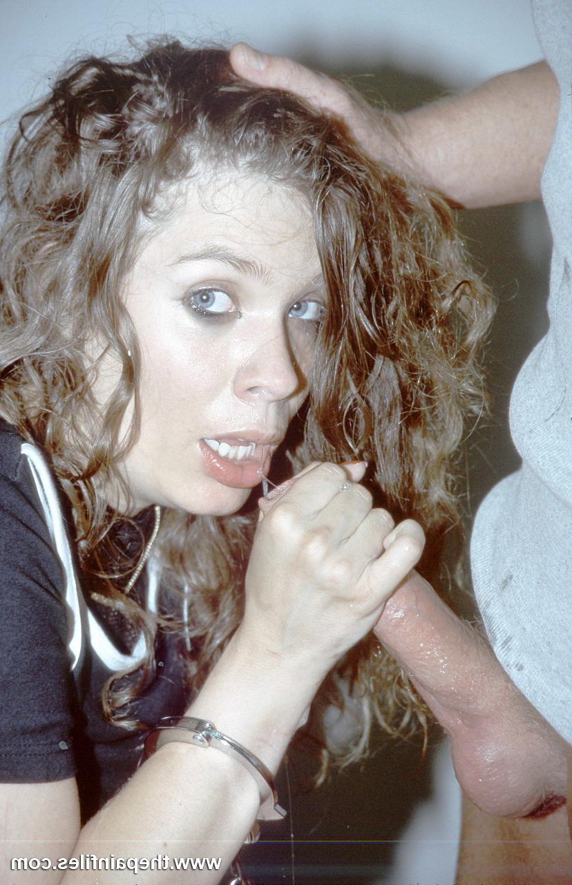 16P Curly haired amateur is hand cuffed on her knees as she sucks co