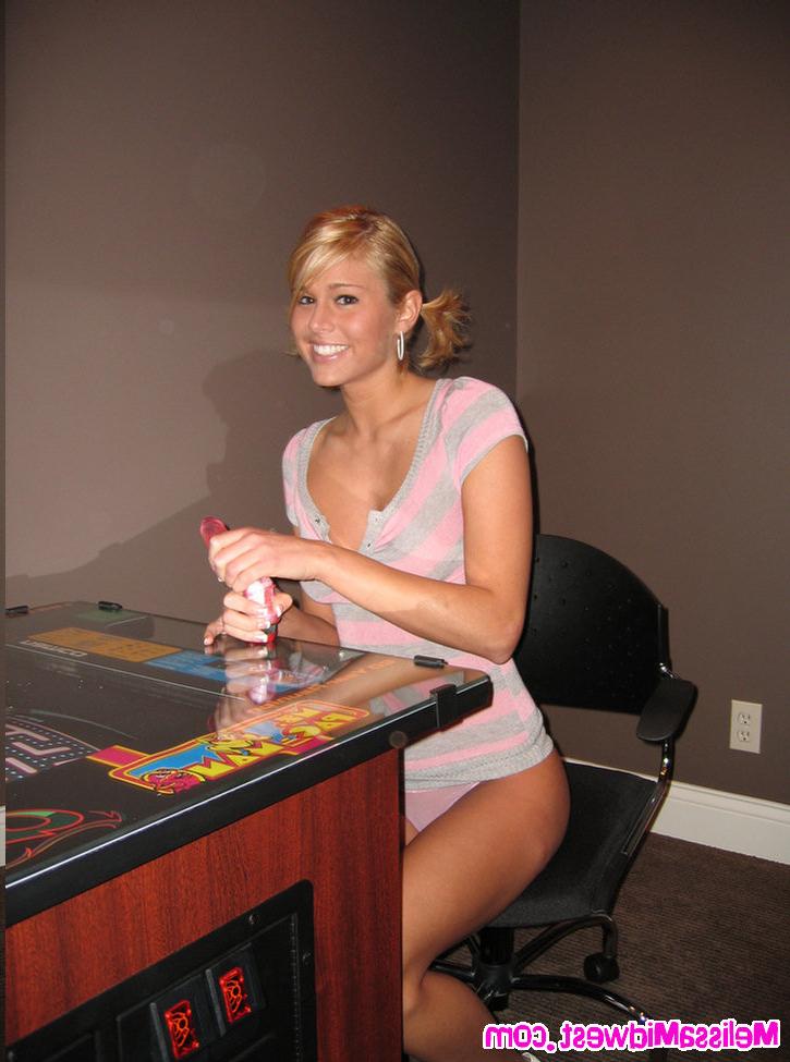 16P Melissa Midwest playing video games with her toy