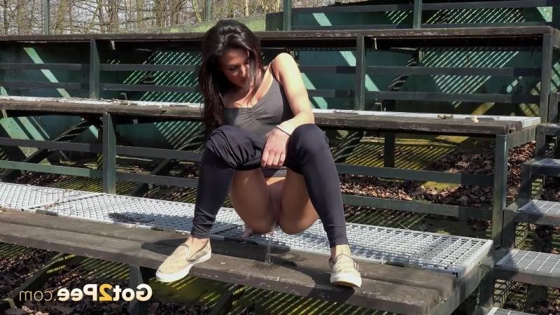 15P Cute dark haired girl pees in public