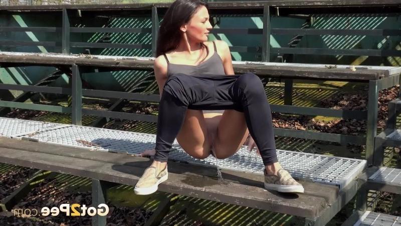 15P Cute dark haired girl pees in public