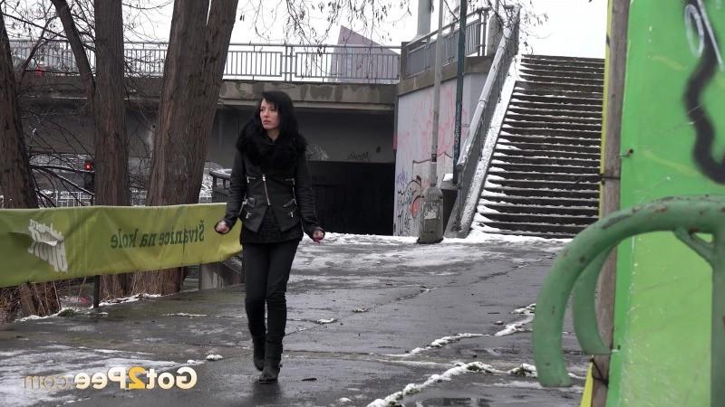 15P Pretty dark haired girl melts snow as she pees