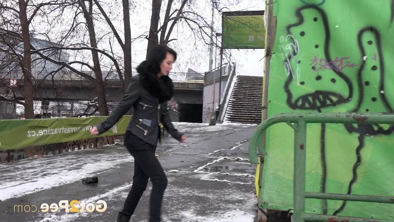 15P Pretty dark haired girl melts snow as she pees