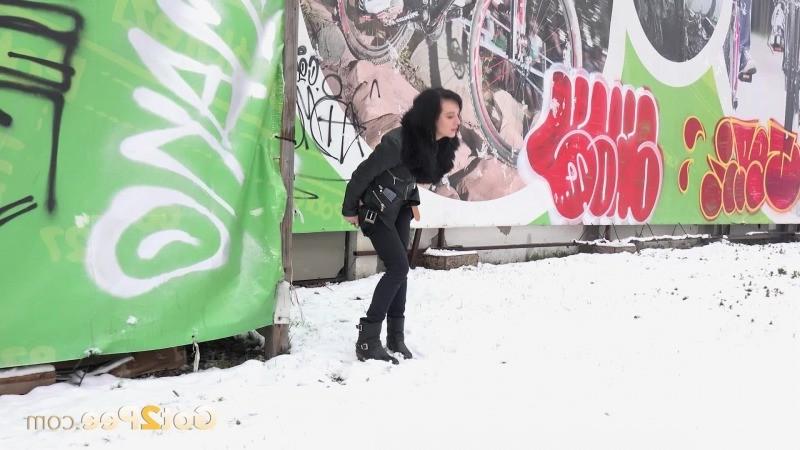 15P Pretty dark haired girl melts snow as she pees