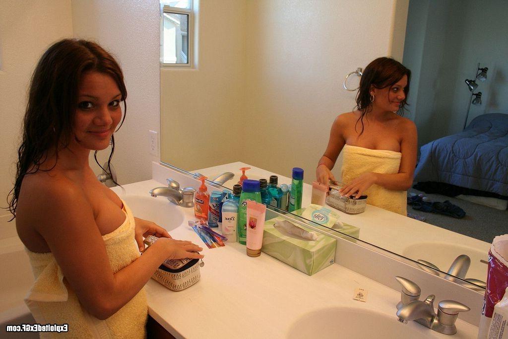 15P Busty amateur chick showing body after shower