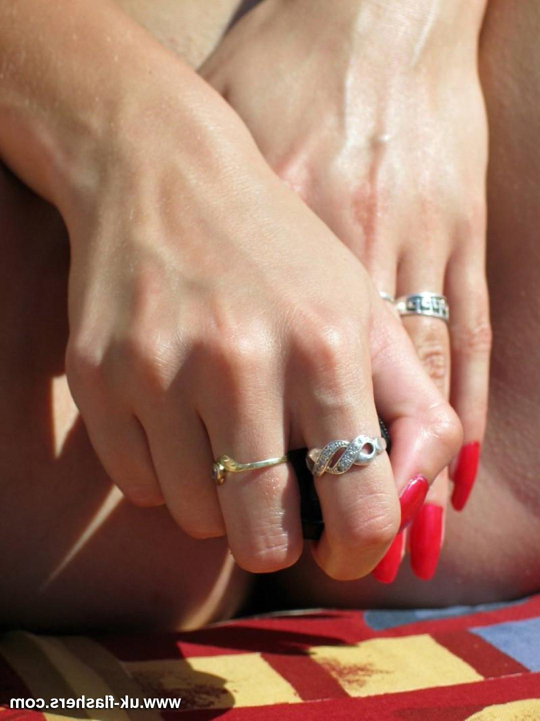 16P Amateur blonde exhibitionist sun bathing on the roof and toying 