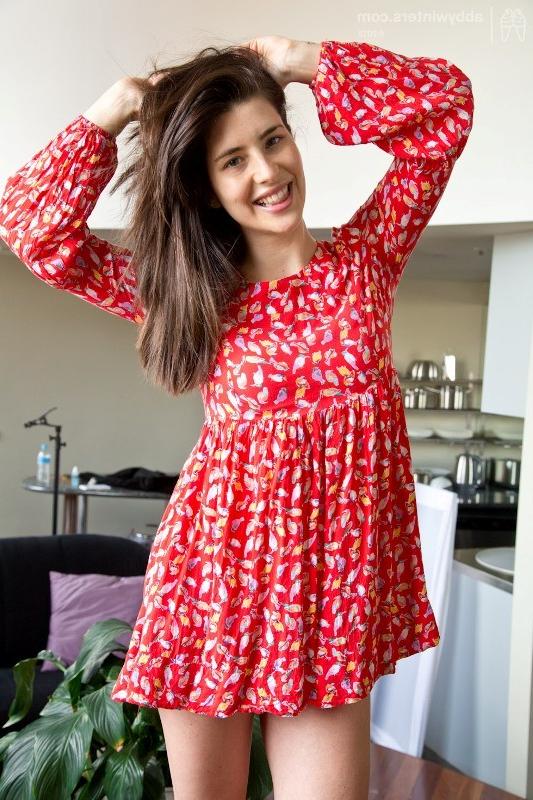 15P Long haired brunette undressing and posing at home