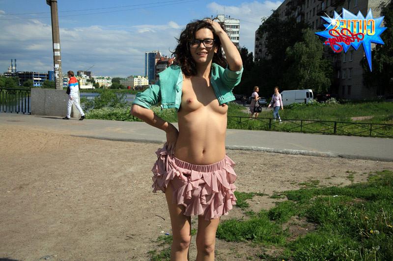 15P Curly girl with mouthwatering titties flashes body