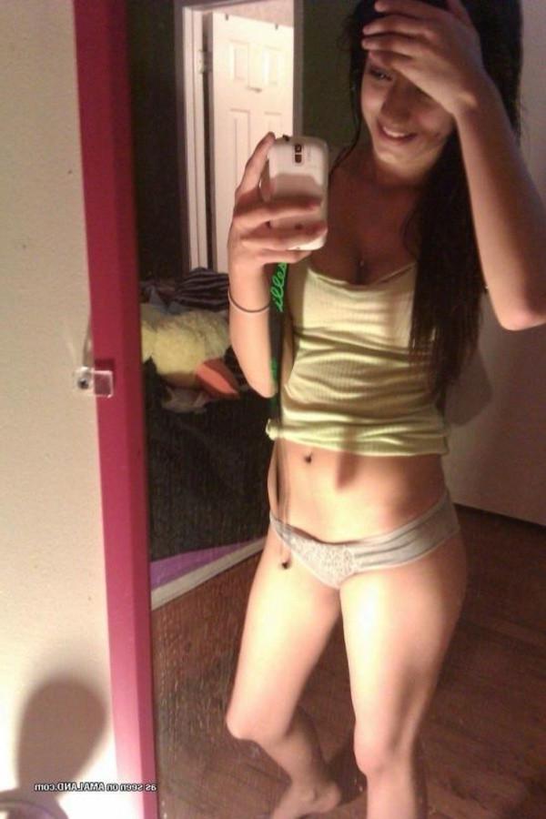 11P Amateur lovely brunette teen taking topless mirror pics