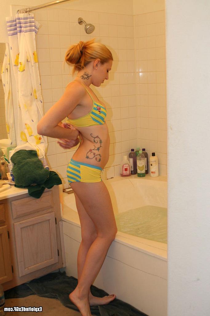 15P Horny blonde taking warm shower