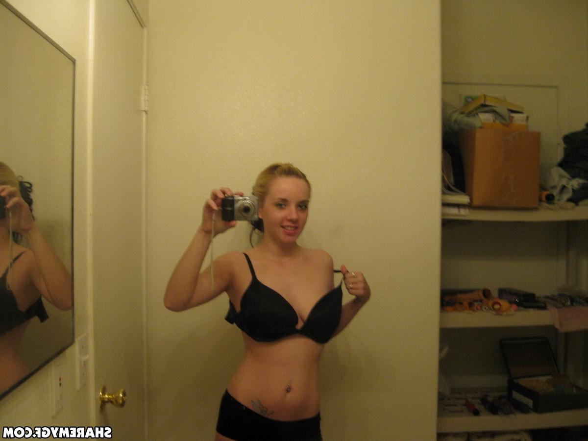 12P Cute blonde gets naked and takes selfshot mirror pics