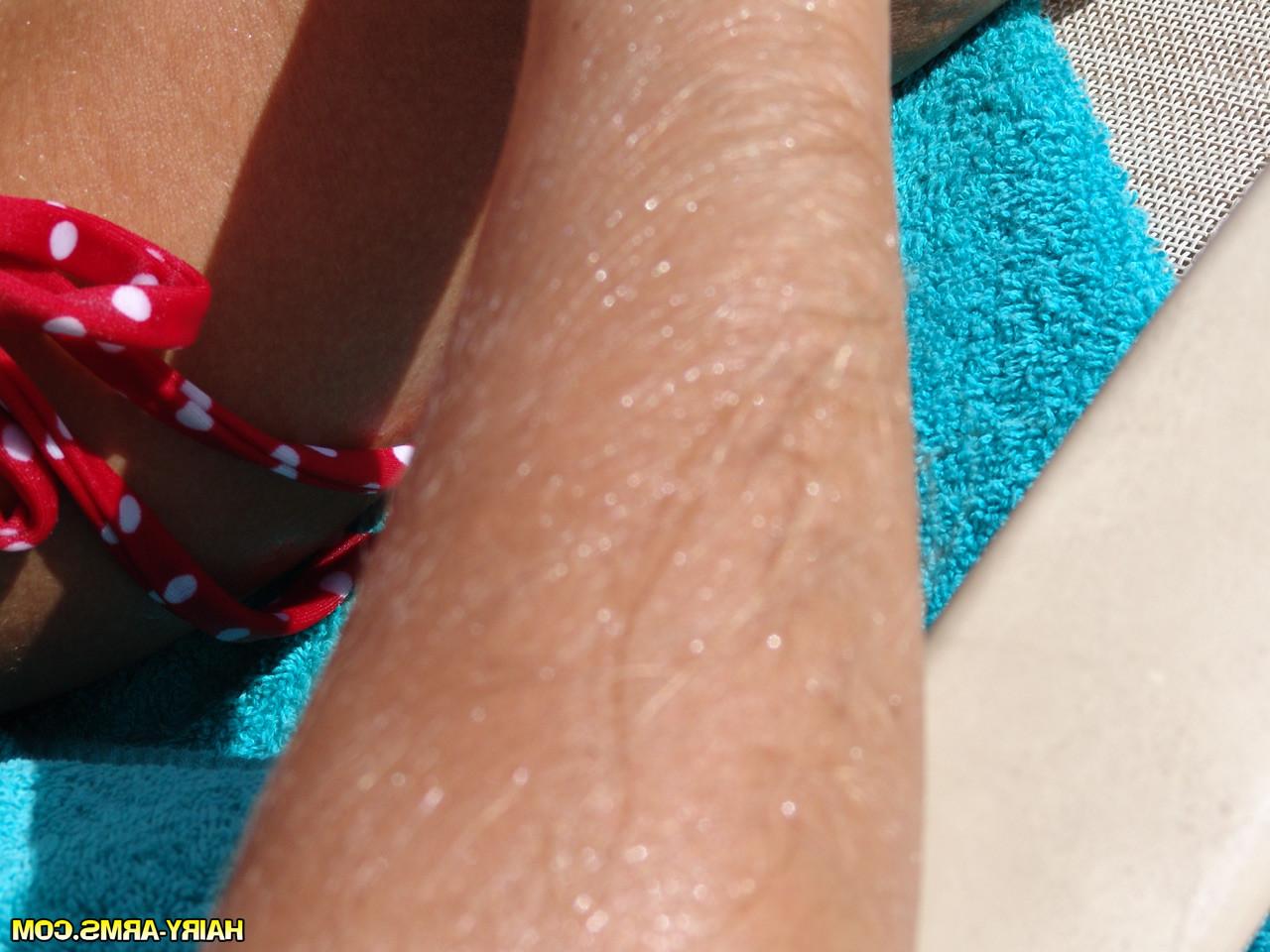 13P Lori Anderson lounging in her red polka dot thong