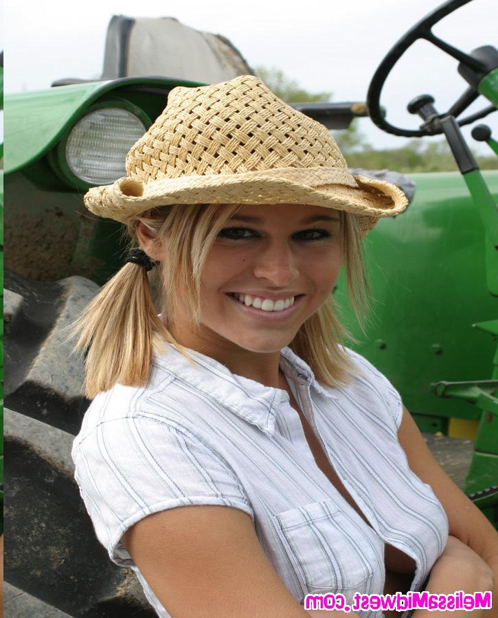 15P Melissa Midwest on the farm next to a tractor
