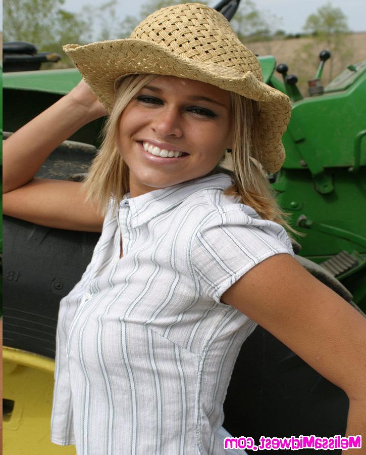 15P Melissa Midwest on the farm next to a tractor