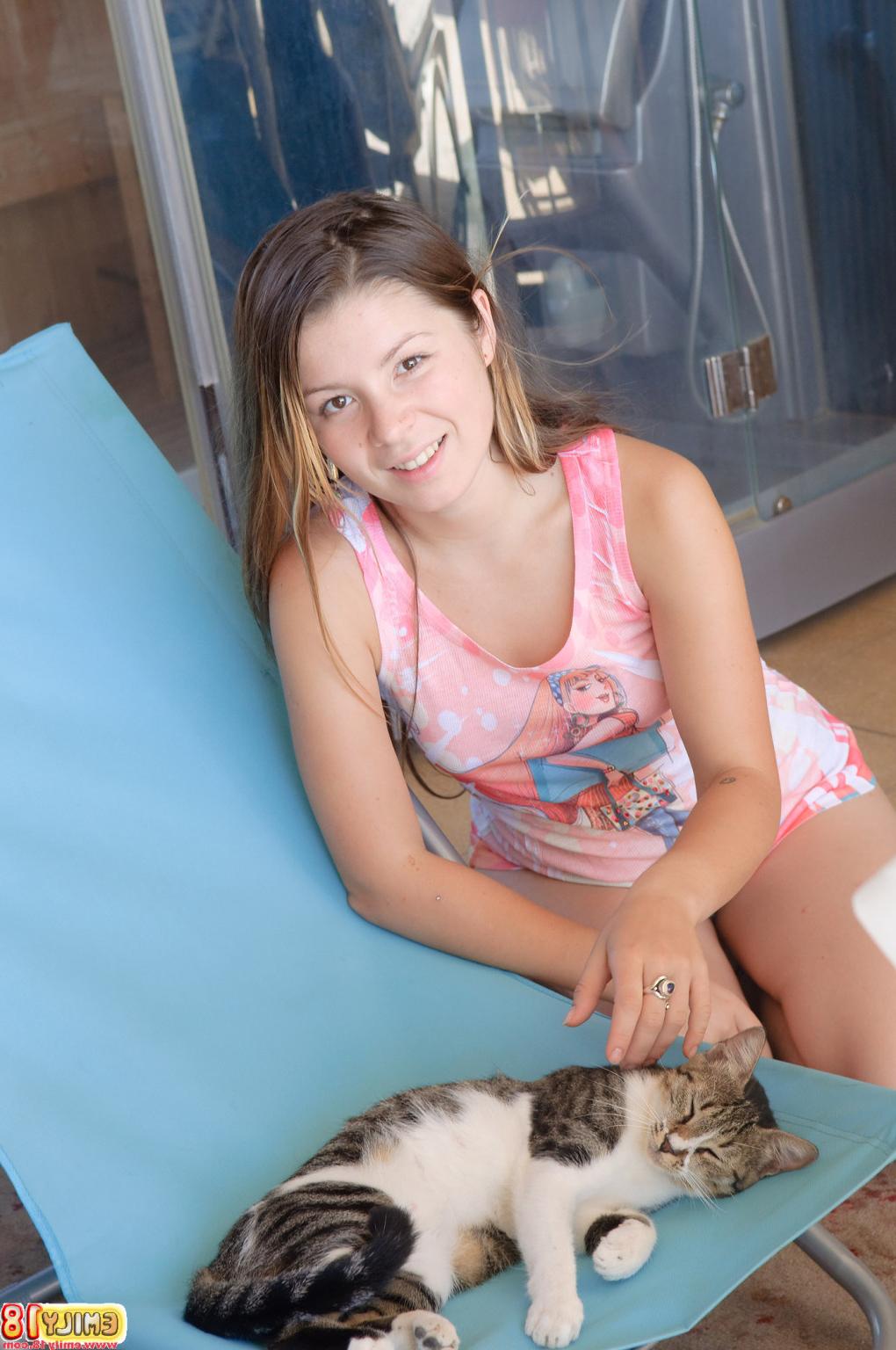 15P Emily 18 plays with her cat and then the sexy young lady takes off her top to sh