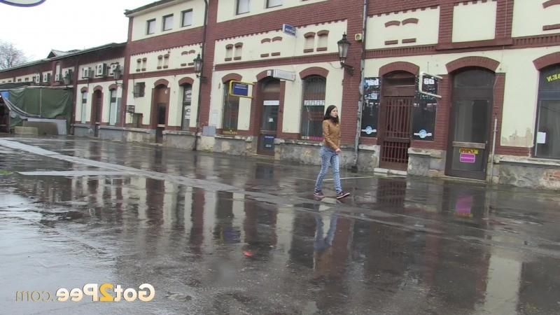 15P Gorgeous dark haired girl pees in public