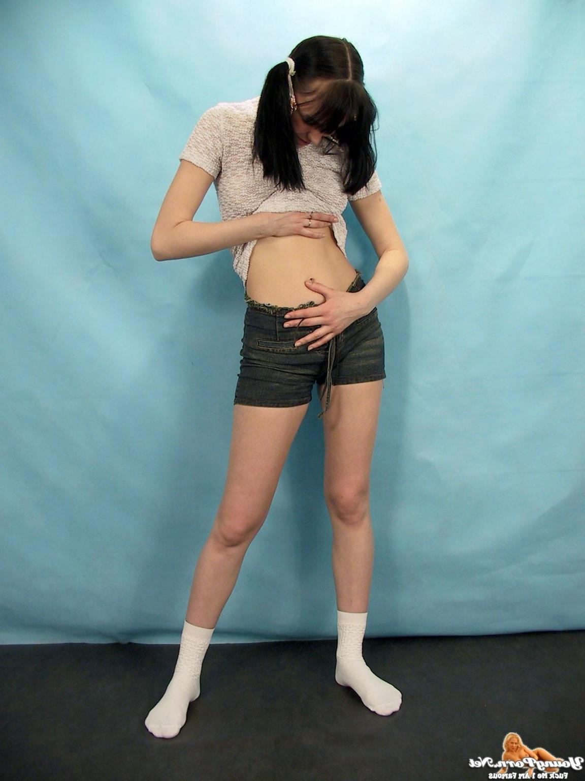 15P Black haired sweetie spreading her legs