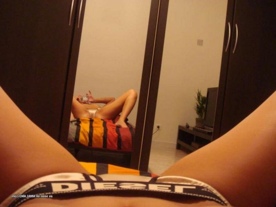 11P Camwhoring amateur sexy chick in lingerie gets naughty