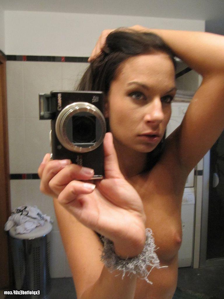 15P Tiny horny amateur taking pictures of her nude body