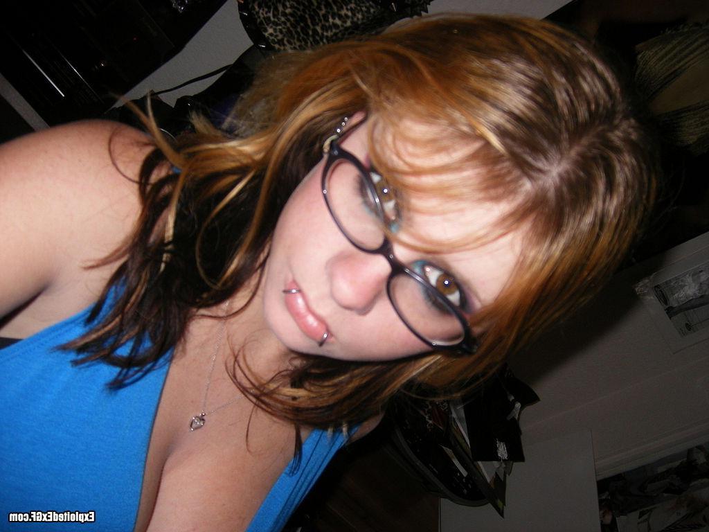 15P Amateur with glasses shows her big tits