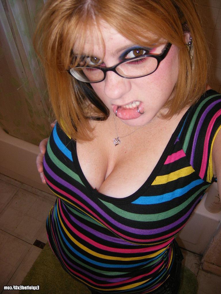 15P Amateur with glasses shows her big tits