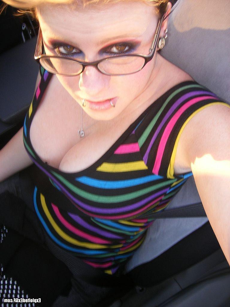 15P Amateur with glasses shows her big tits