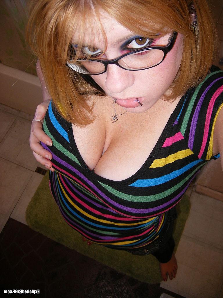 15P Amateur with glasses shows her big tits