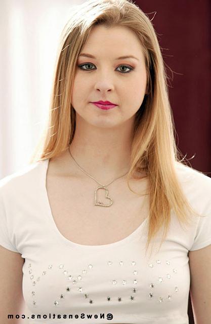 15P Sunny Lane bends over to show her big ass, small anus, and smooth pussy