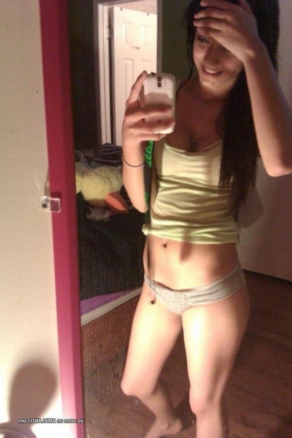 11P Amateur lovely brunette teen taking topless mirror pics