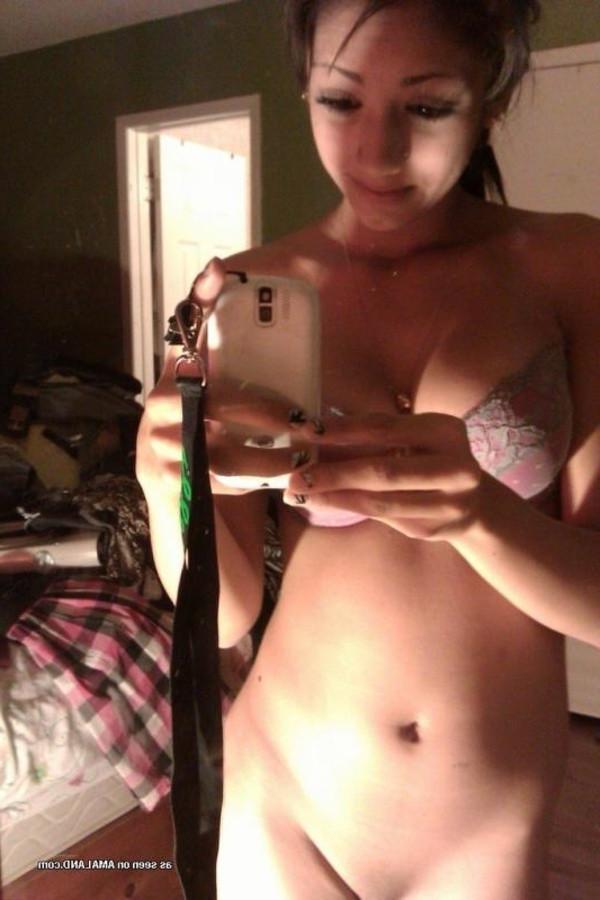 11P Amateur lovely brunette teen taking topless mirror pics