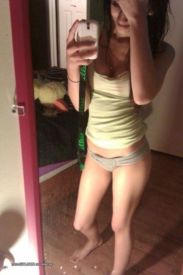 11P Amateur lovely brunette teen taking topless mirror pics