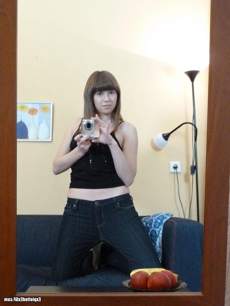 15P Tiny sexy teen showing her hairy pussy