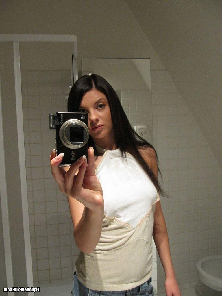 15P Beautiful tiny chick shooting herself nude in bathroom