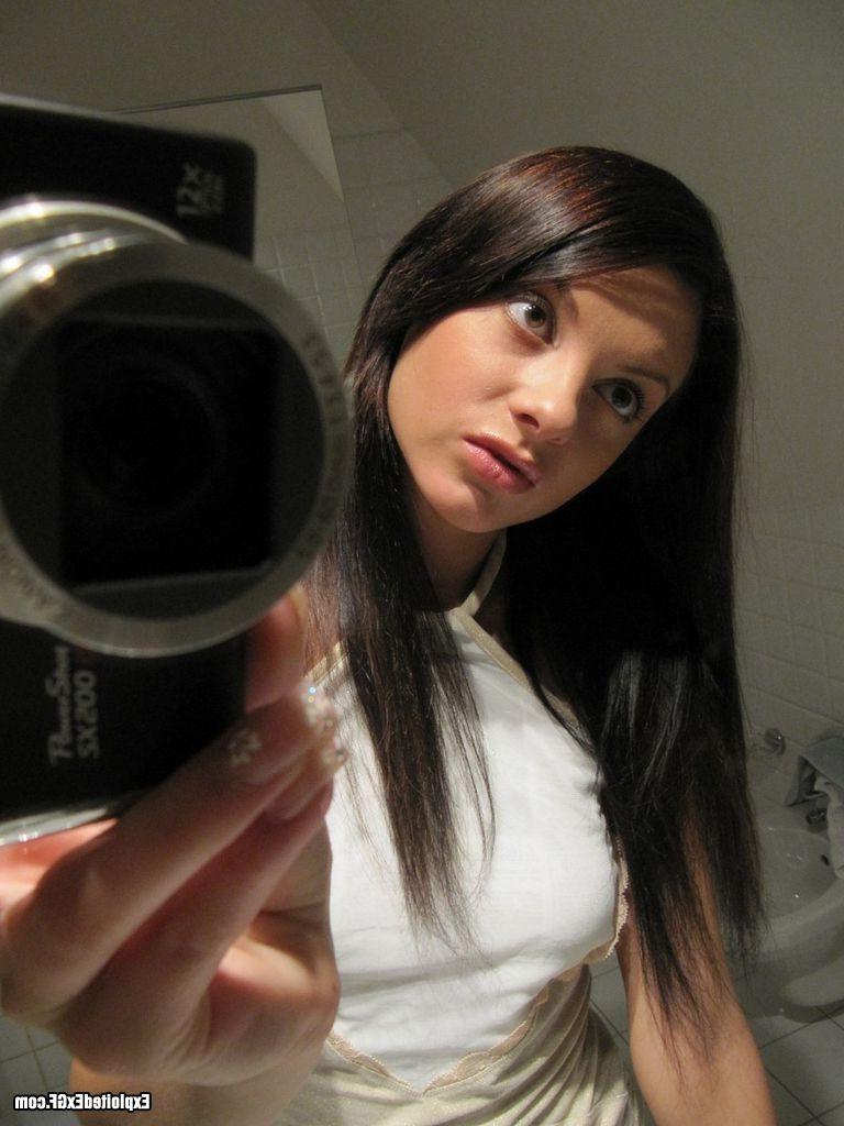 15P Beautiful tiny chick shooting herself nude in bathroom