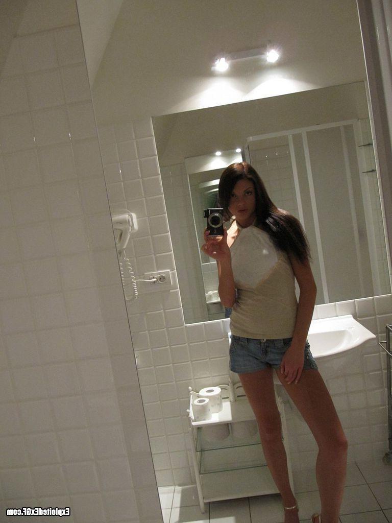 15P Beautiful tiny chick shooting herself nude in bathroom
