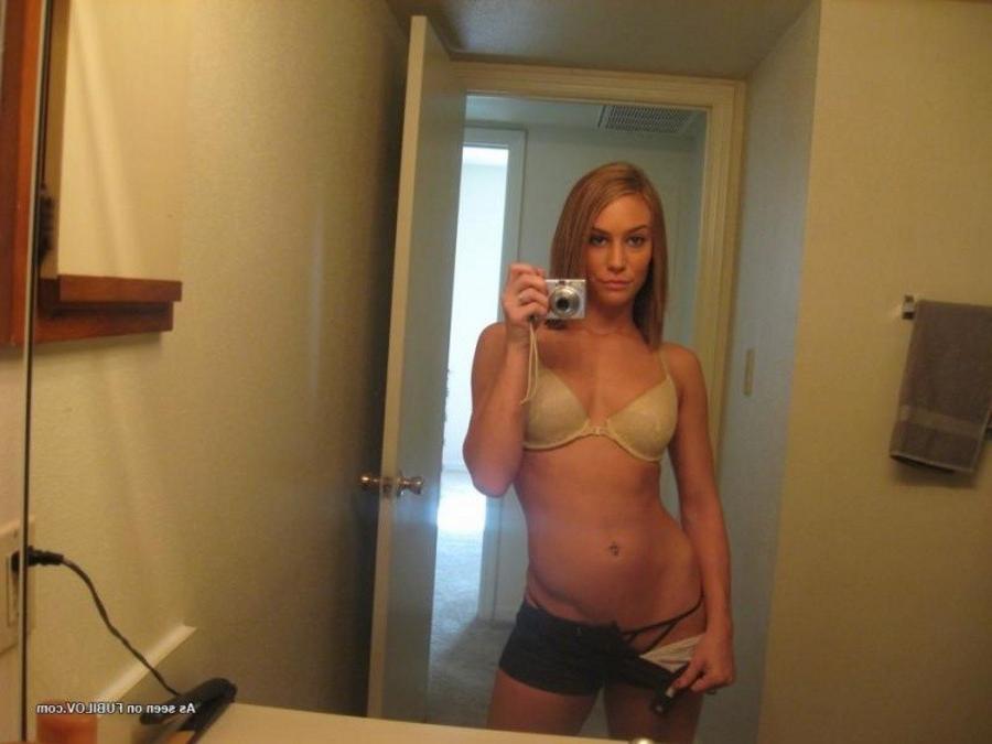 9P Gorgeous chick stripping naked while selfshooting
